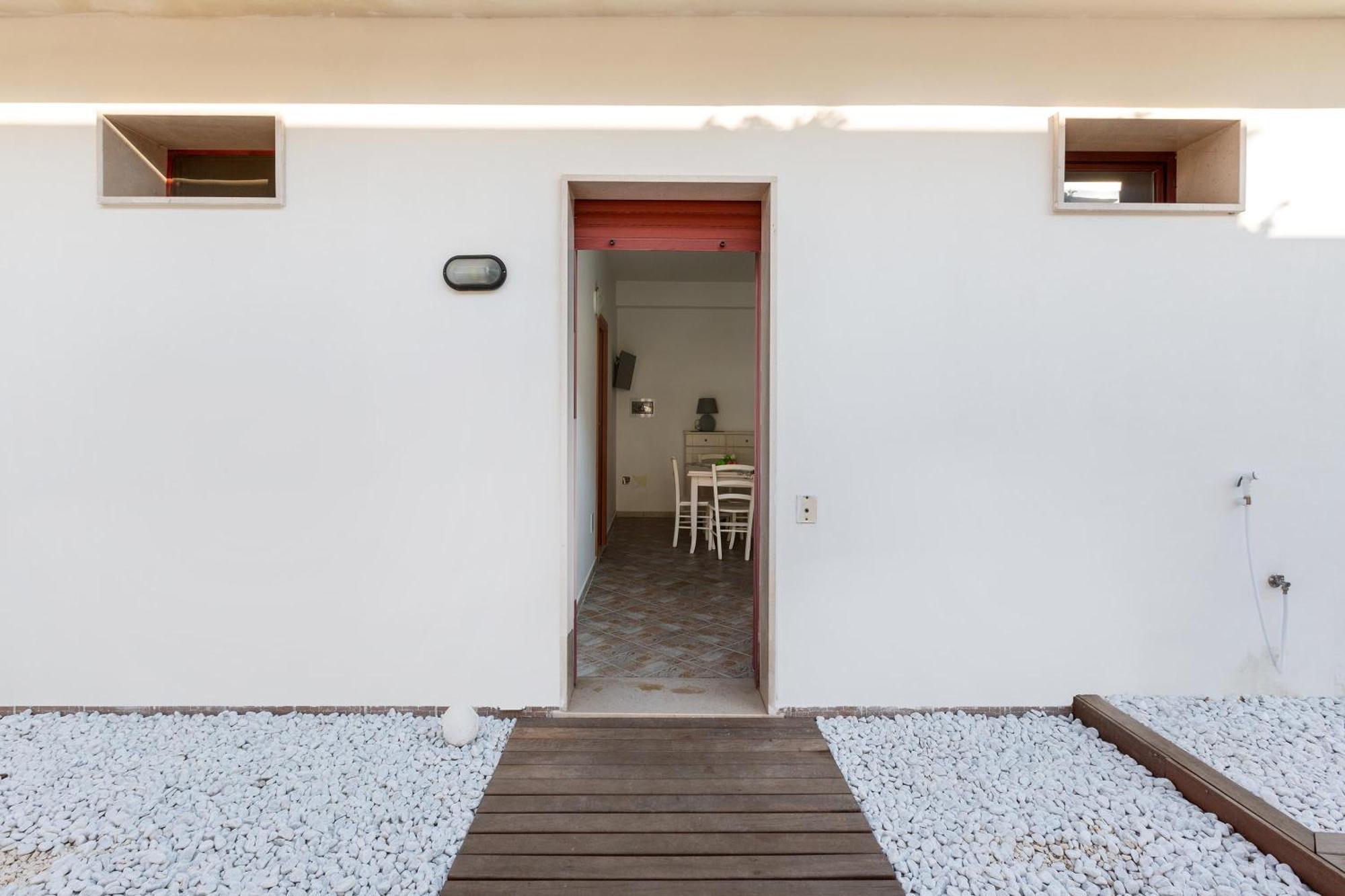 Joy Home Apartments Maruggio Quarto foto