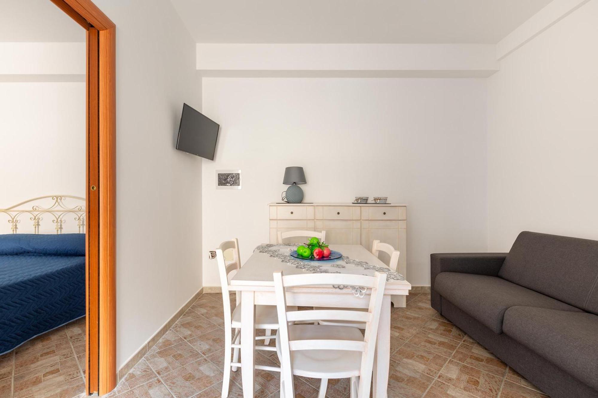 Joy Home Apartments Maruggio Quarto foto