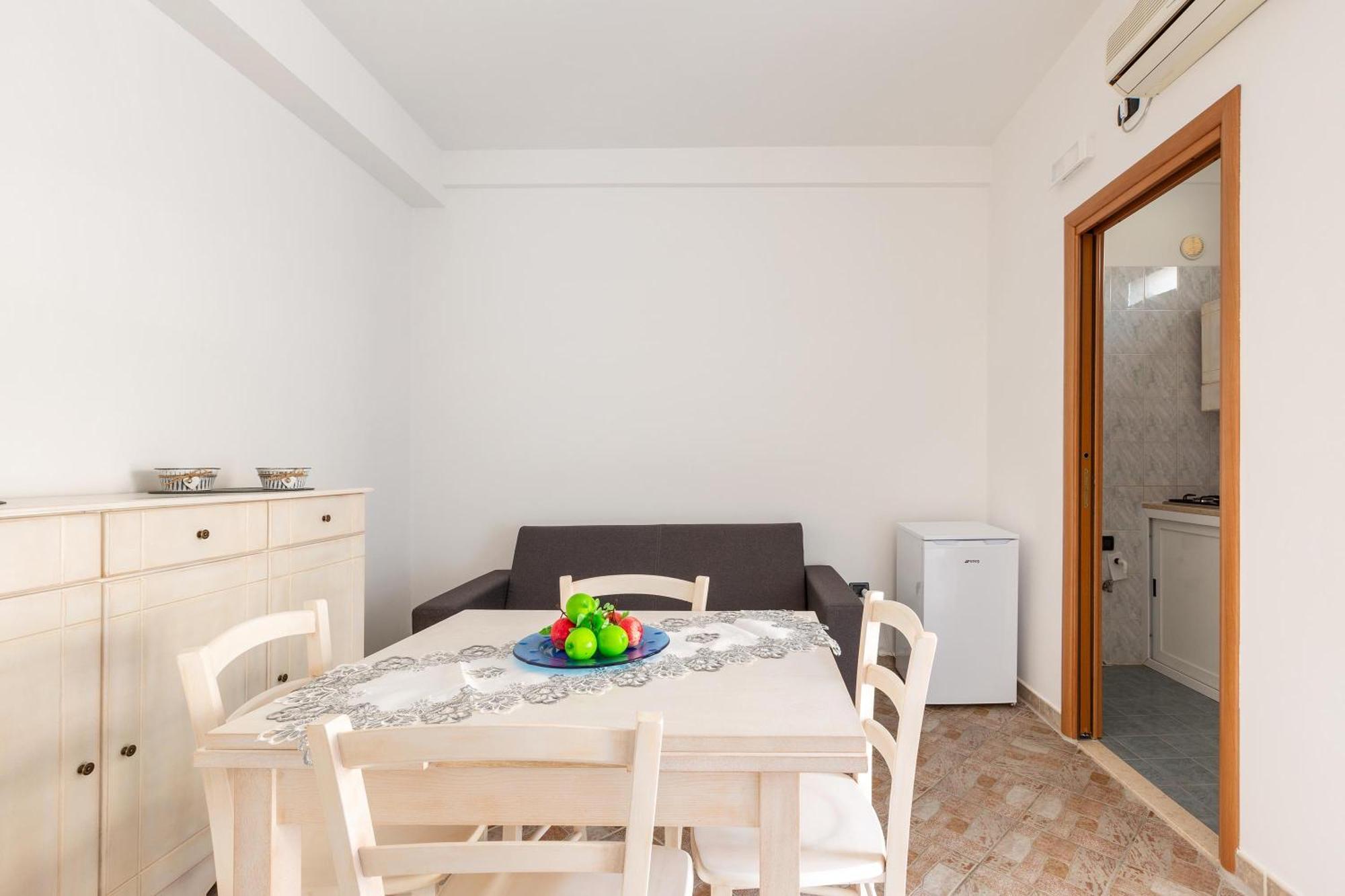 Joy Home Apartments Maruggio Quarto foto